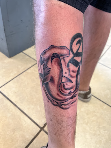 Find flower thigh tattoo ideas for your next unique tattoo in South Padre Island at Seven Sparrows Tattoo