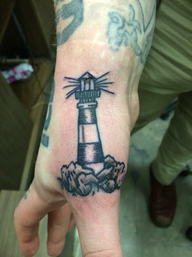 Explore women's tattoo ideas wrist, creative tattoo ideas in Muncie, available at The Tattoo Studio