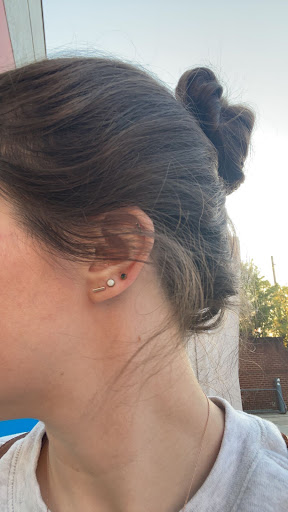 Explore neck tattoo ideas woman, creative tattoo ideas in Chattanooga, available at Monarch Fine Jewelry Professional Piercing