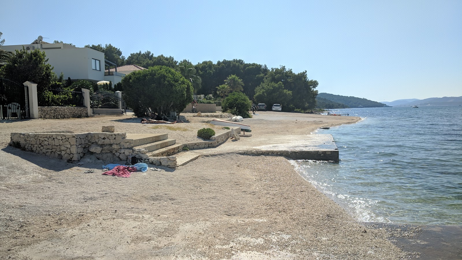 Photo of Okrug Gornji II beach with turquoise pure water surface