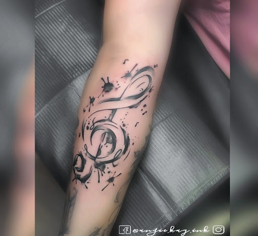 Explore women's forearm tattoos ideas, creative tattoo ideas in Casper, available at Luna & Lotus Amethyst Ink Angie Kay