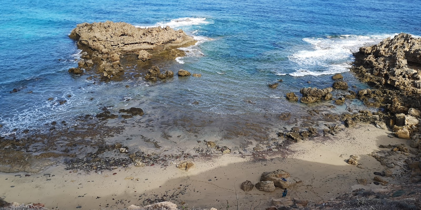 Zdjęcie Porto De Frades Beach z poziomem czystości wysoki