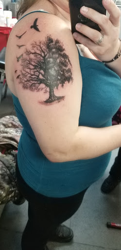 Explore tattoo ideas for photographers, creative tattoo ideas in Bellevue, available at Absolute Tattoos & Body