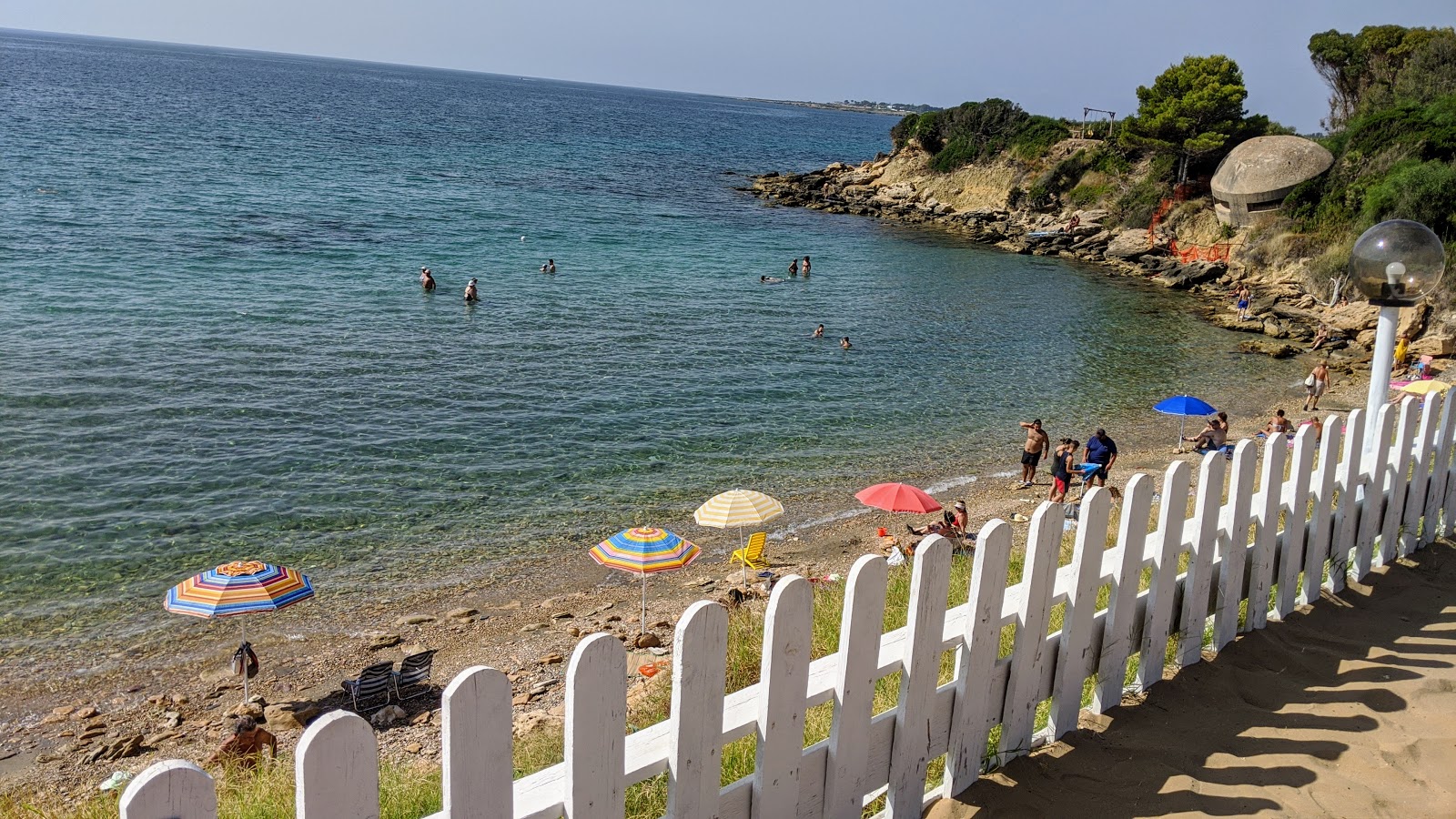 Spiaggia Fanusa'in fotoğrafı turkuaz saf su yüzey ile