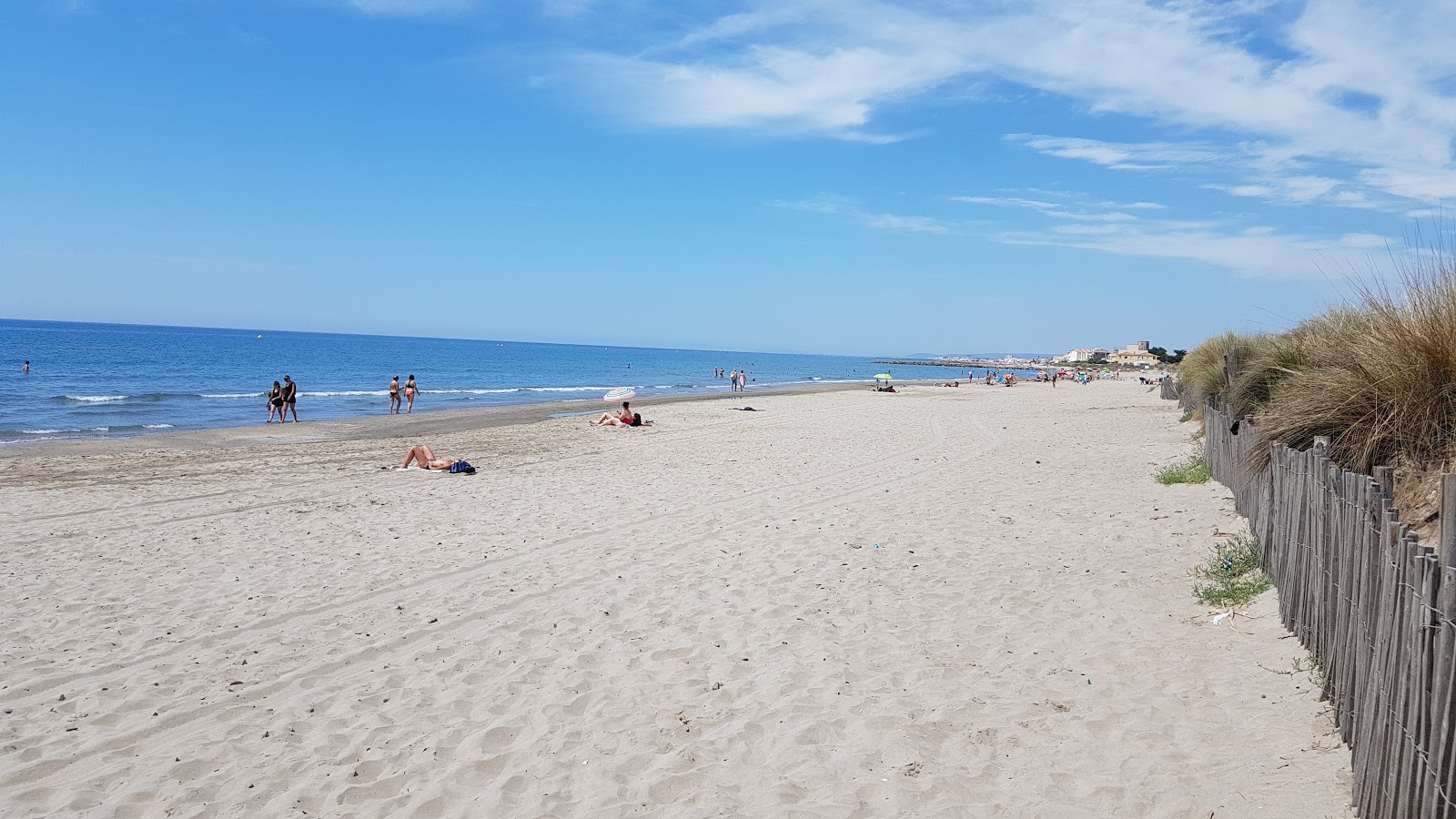 Foto von Le Petit Travers beach mit feiner beiger sand Oberfläche