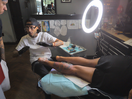 Explore tattoo ideas on leg for men, creative tattoo ideas in Kissimmee, available at Ol Skool Tattoos Studio