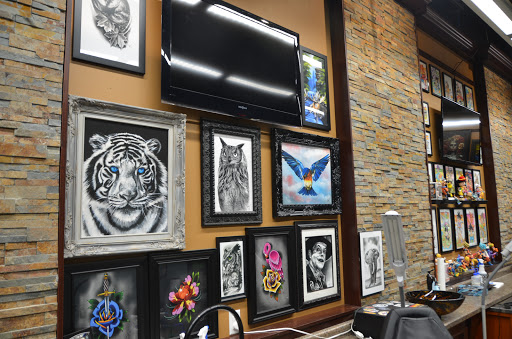 Tattoo Shop «Neon Dragon Tattoos», reviews and photos, 5350 Council St NE Ste E, Cedar Rapids, IA 52402, USA
