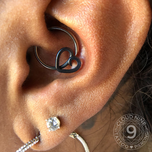 Explore behind ear tattoo ideas, creative tattoo ideas in Birmingham, available at Cloud 9 Tattoo & Piercing STUDIO