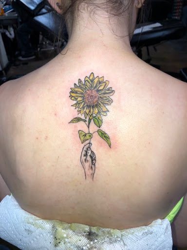 Explore tattoo ideas for back of the neck, creative tattoo ideas in Dallas, available at Freak Show Studio