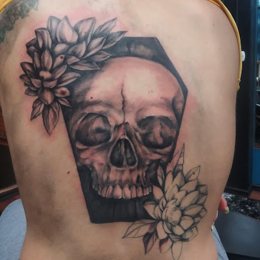 Explore tanning tattoo ideas, creative tattoo ideas in Colorado Springs, available at Skin Evolution Tattoo