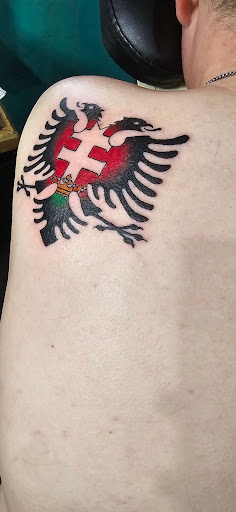 Explore lupus tattoo ideas, creative tattoo ideas in San Diego, available at Sideshow Tattoo and Piercing