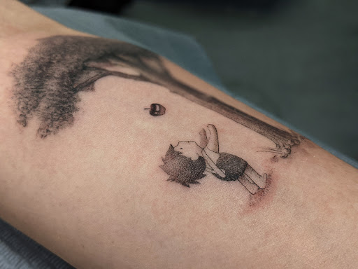 Explore last name back tattoo ideas, creative tattoo ideas in Los Angeles, available at K Tattoo