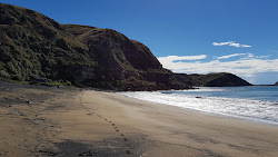 Tangoio Beach'in fotoğrafı geniş bir kıyı şeridi ile birlikte