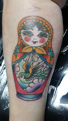 Explore country music tattoos ideas, creative tattoo ideas in Powell, available at Hummingbird Tattoo Studio