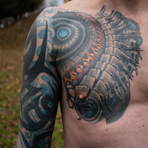 Explore artillery tattoo ideas, creative tattoo ideas in Girard, available at Empress Tattoos FKA Treehouse Tattoo