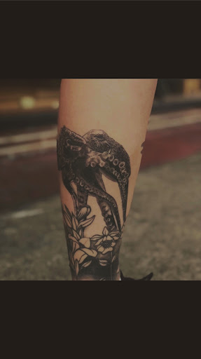 Explore quarter size tattoo ideas, creative tattoo ideas in Graham, available at Transcendence Art Studio & Tattoo