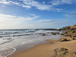 Photo de Playa del Faro entouré de montagnes