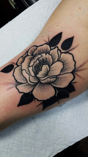 Explore surf tattoo ideas, creative tattoo ideas in Kannapolis, available at Ink Station Tattoo Studio