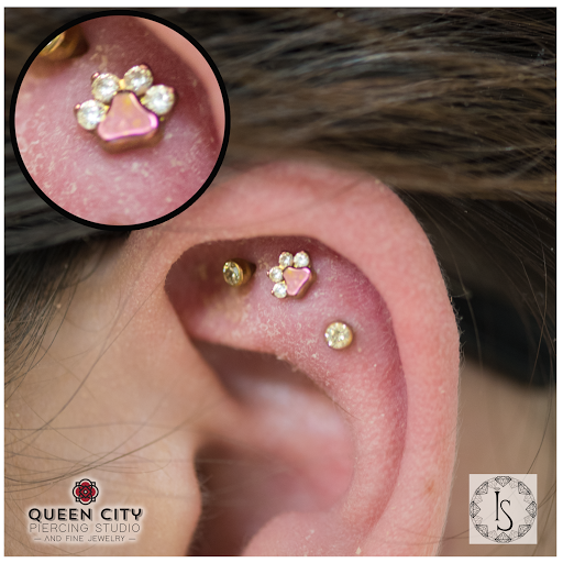 Explore thigh tattoo ideas for females, creative tattoo ideas in Terre Haute, available at Queen City Piercing Studio