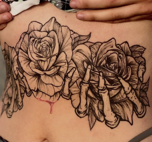 Explore pink ribbon tattoo ideas, creative tattoo ideas in Washington, available at Tu Madres Tattoo