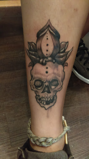 Find cool dog tattoo ideas for your next unique tattoo in Bridgeport at Pike Street Studios Tattoo and Body Piercing