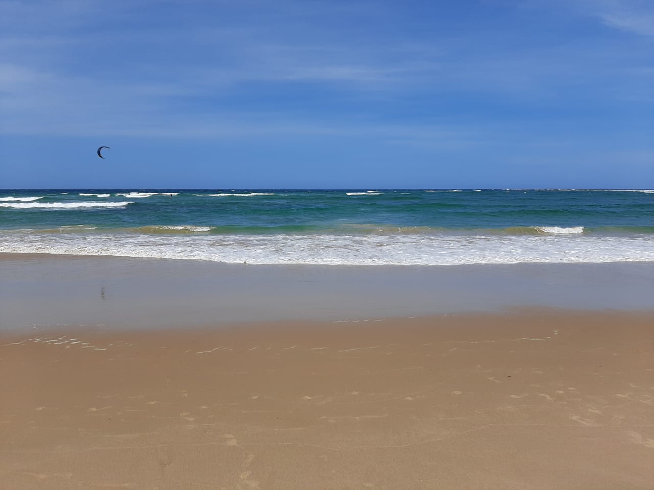 Foto van Praia da Barra met recht en lang