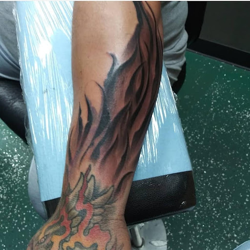 Explore hook tattoo ideas, creative tattoo ideas in Vancouver, available at Studio X Tattoos & Piercings