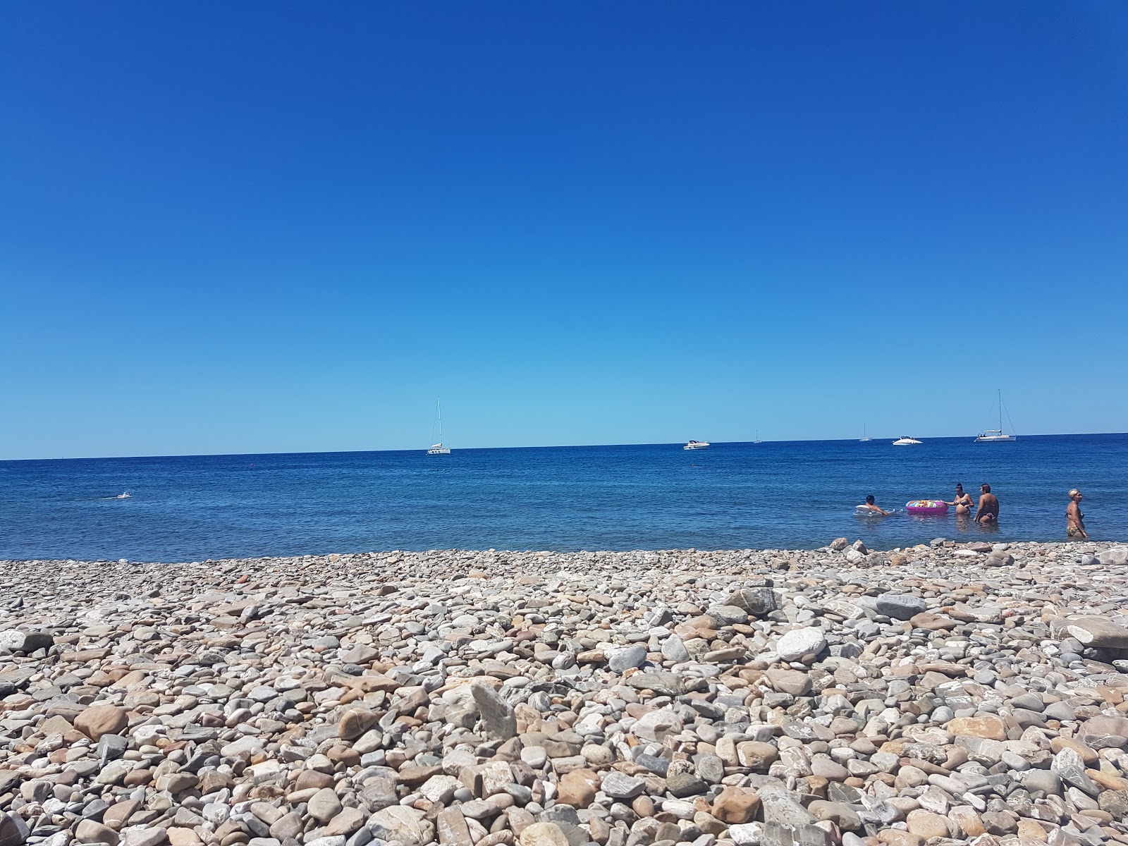 Photo de Spiaggia Marangone avec un rivage spacieux