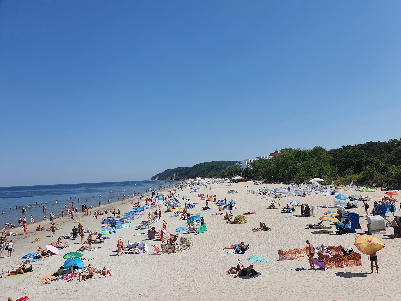 Foto av Plaża Międzyzdroje med fin beige sand yta