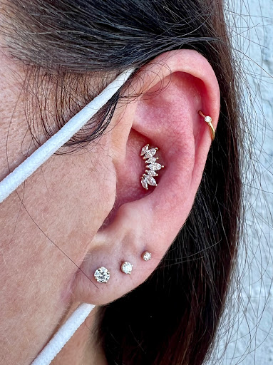 Explore womens neck tattoos ideas, creative tattoo ideas in San Diego, available at Rose Body Piercing