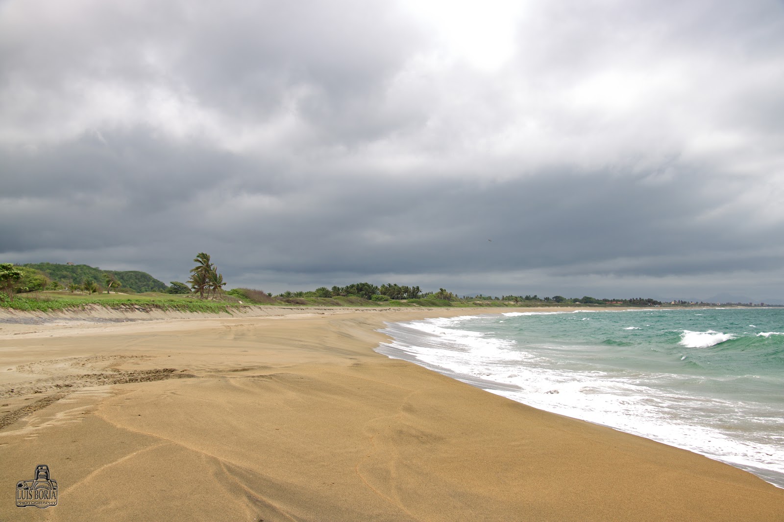 Valokuva Playa el Cocoista. puhtaustasolla keskipitkä