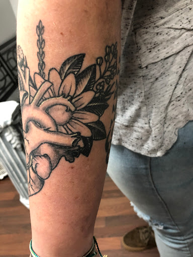 Explore best christian tattoo ideas, creative tattoo ideas in Wake Forest, available at Revelation Ink Tattoo and Piercing