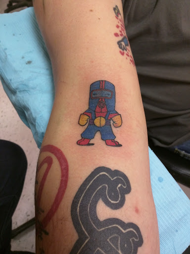 Explore tattoo ideas for swimmers, creative tattoo ideas in Santa Fe, available at The G Spot (I.P.Ink)