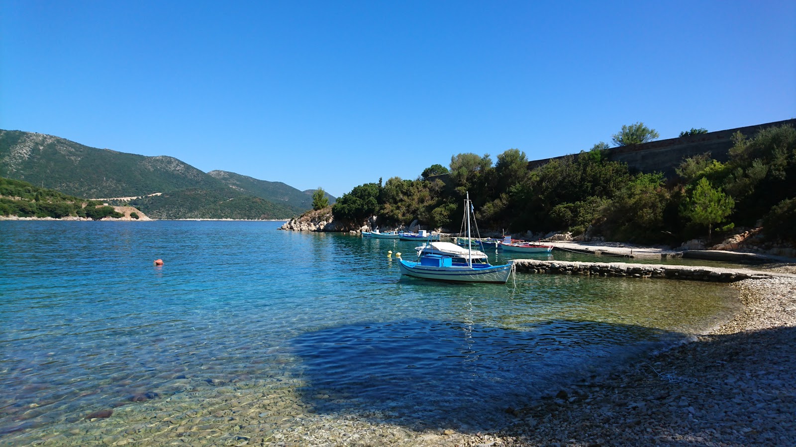 Photo of Mavrona beach with turquoise pure water surface