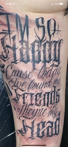 Explore racing tattoo ideas, creative tattoo ideas in Benson, available at Dark Matter Tattoo Studio