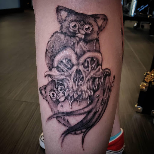 Explore feminine dragon tattoo ideas, creative tattoo ideas in Palm Harbor, available at Angry Owl Tattoo and Piercing