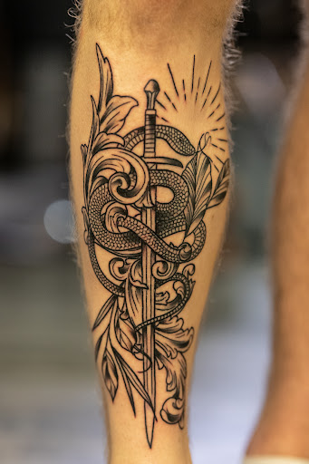 Explore june birth flower tattoo ideas, creative tattoo ideas in Leesville, available at Revolution Ink Tattoo and Art Gallery