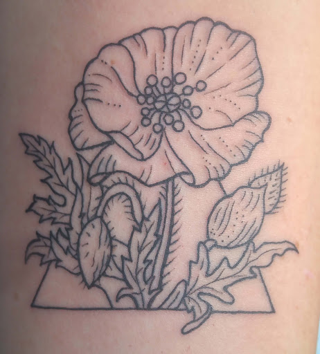 Explore thigh flower tattoo ideas, creative tattoo ideas in Nashville, available at Titan Tattoo