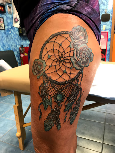 Explore ferret tattoo ideas, creative tattoo ideas in Aurora, available at Ronin Tattoo Studio INC