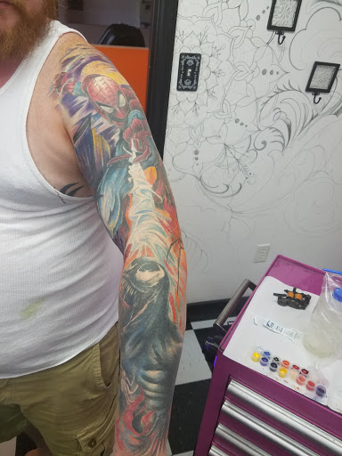 Explore dahlia tattoo ideas, creative tattoo ideas in Nicholasville, available at Castle of Color