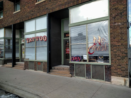 Explore tattoo cover up ideas for shoulder, creative tattoo ideas in Fargo, available at No Coast Tattoo