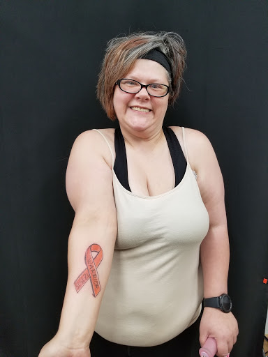 Explore owl tattoo ideas for females, creative tattoo ideas in Galesburg, available at Hawks Tattoos