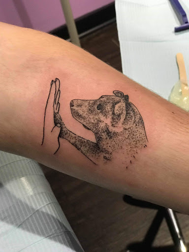 Explore military dog tag tattoo ideas, creative tattoo ideas in Asheboro, available at Blue Luna Tattoo Company, LLC