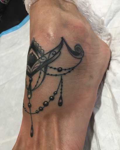 Explore tattoo ideas for black women, creative tattoo ideas in Kissimmee, available at Fallen Heroes Tattoo & Piercing (Florida)