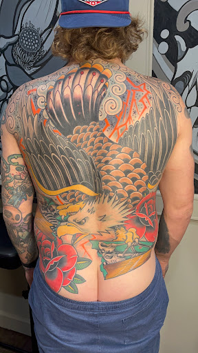 Explore sunrise tattoo ideas, creative tattoo ideas in Ogden, available at One Thousand Cranes Tattoo Studio