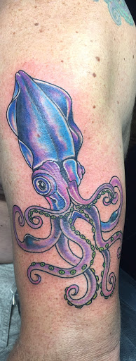 Explore pansy tattoo ideas, creative tattoo ideas in Miami Beach, available at Empire Ink, South Beach