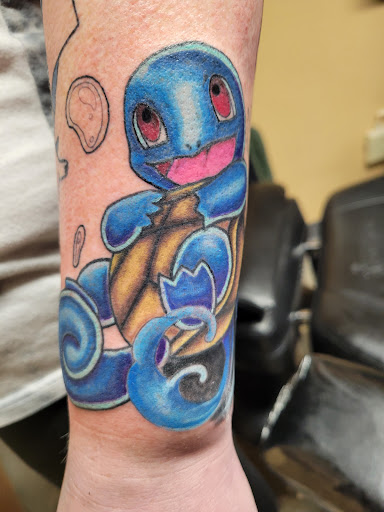 Explore red tattoo ideas, creative tattoo ideas in Waterloo, available at Friki Tiki Tattoo and Gallery