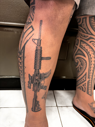 Explore lower back tattoo ideas for men, creative tattoo ideas in Honolulu, available at Sacred Art Tattoo Waikiki