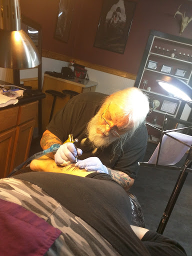 Explore dirtbike tattoo idea, creative tattoo ideas in Higginsville, available at Creative Canvas Tattoo