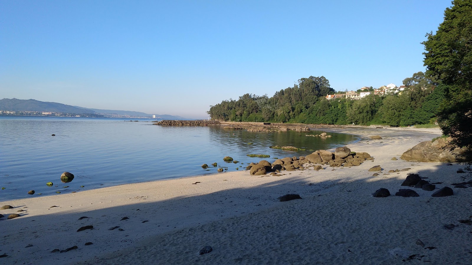 Photo de Praia de Vilela avec sable blanc de surface